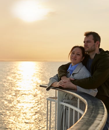 A couple in the sunset on the deck