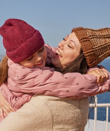 Happy family out on the deck in winter